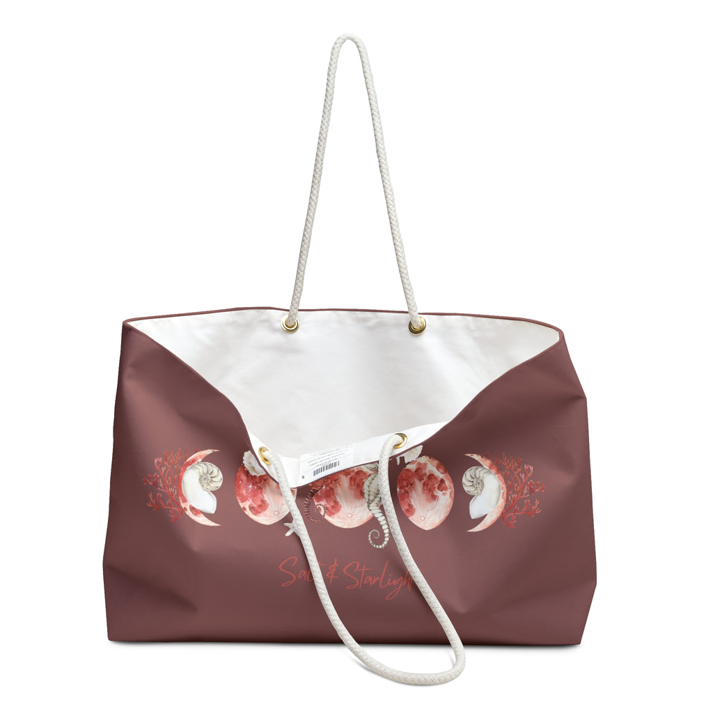 Salt & Starlight oversized weekender bag in dusty rose, open view showing the white interior