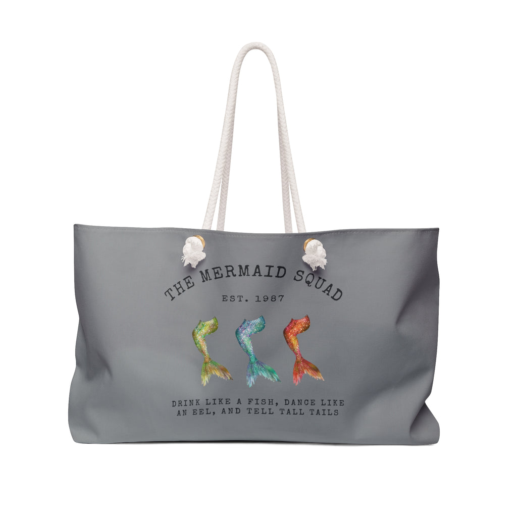 The Mermaid Squad oversized weekender bag in grey, front view with three colorful mermaid tails design