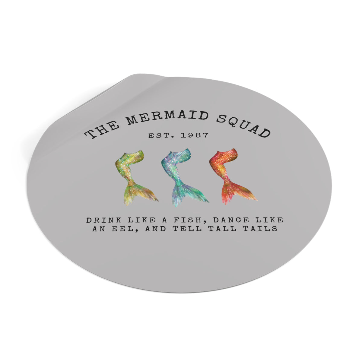 The Mermaid Squad round vinyl sticker in grey, peeling view, alternate angle