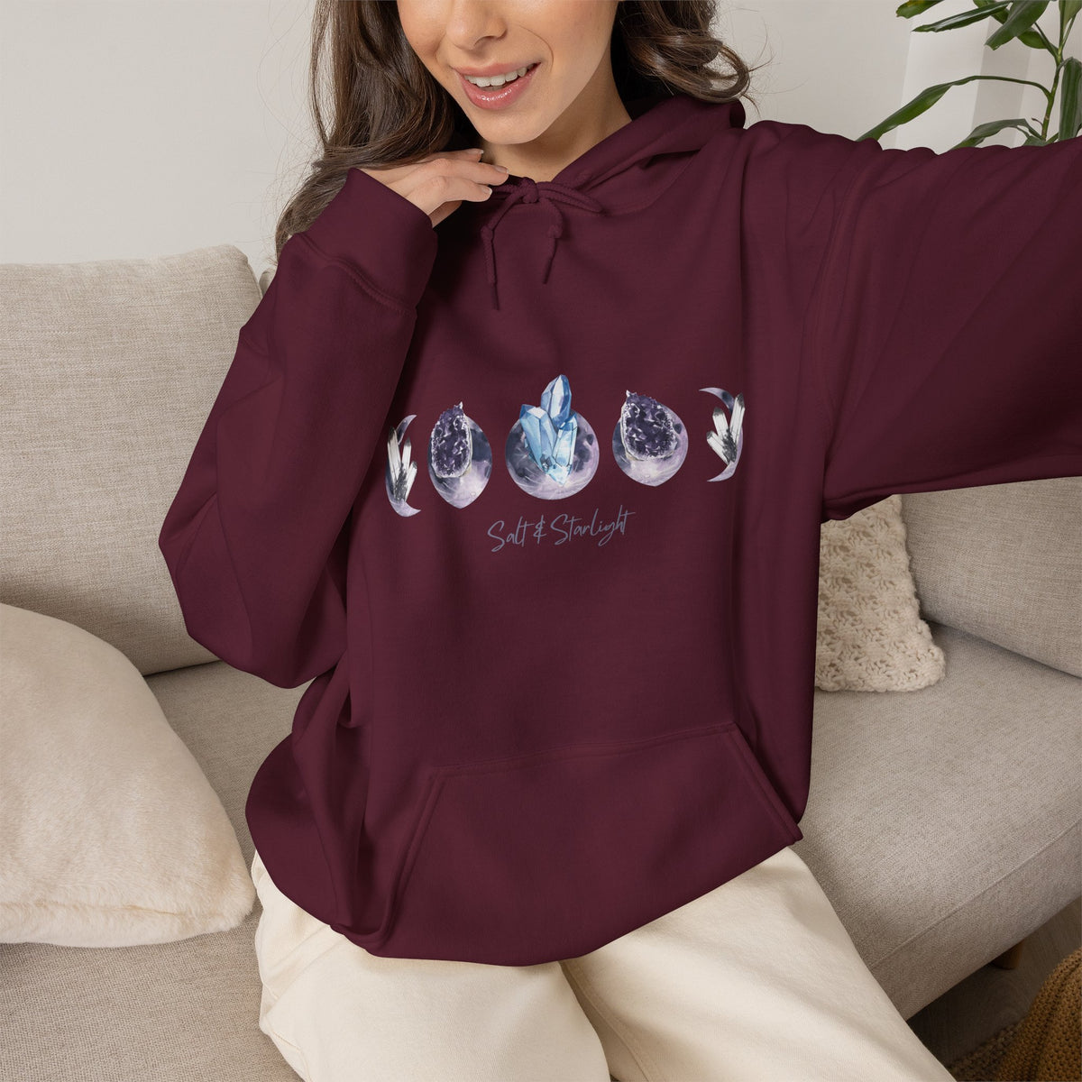 Salt & Starlight hooded sweatshirt in maroon, worn by a model
