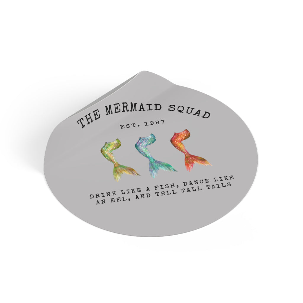 The Mermaid Squad round vinyl sticker in grey, peeling view, alternate angle