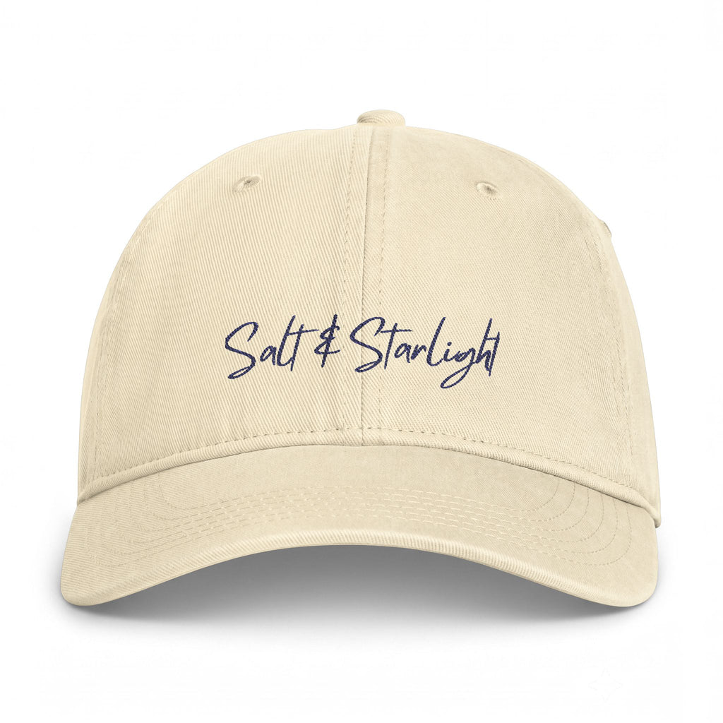 Salt & Starlight washed cap in ivory, front view with embroidered script