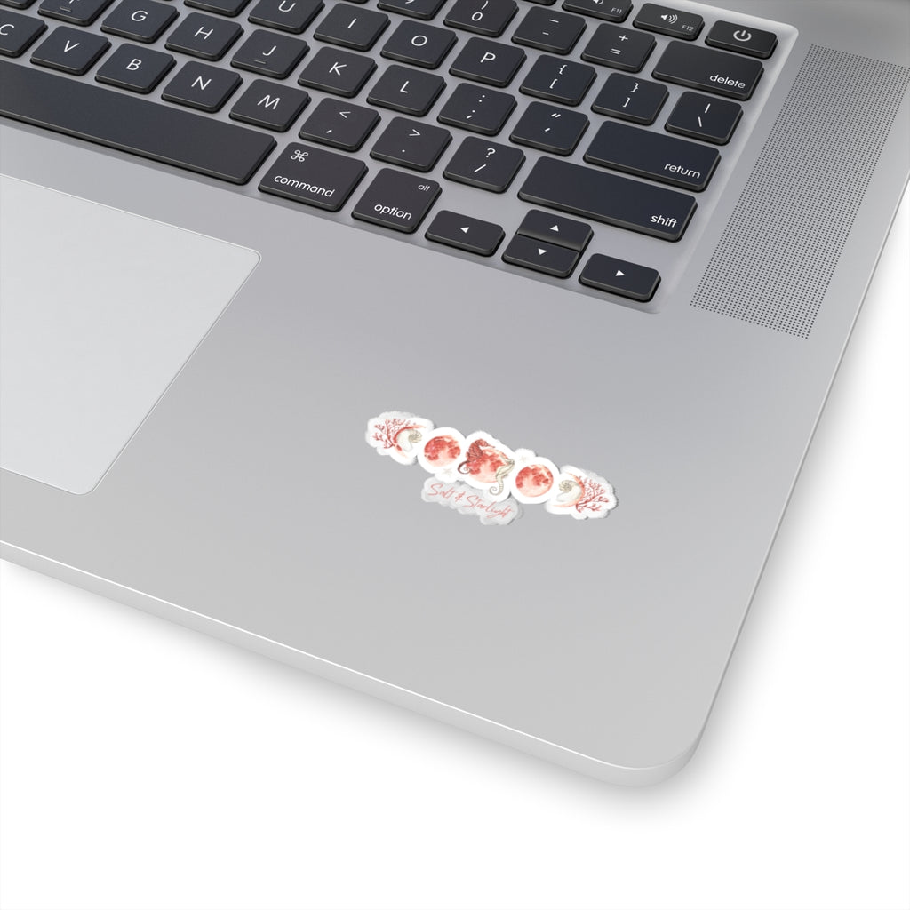 Salt & Starlight kiss-cut sticker with seahorse and coral moon phase design, shown on a laptop, small size
