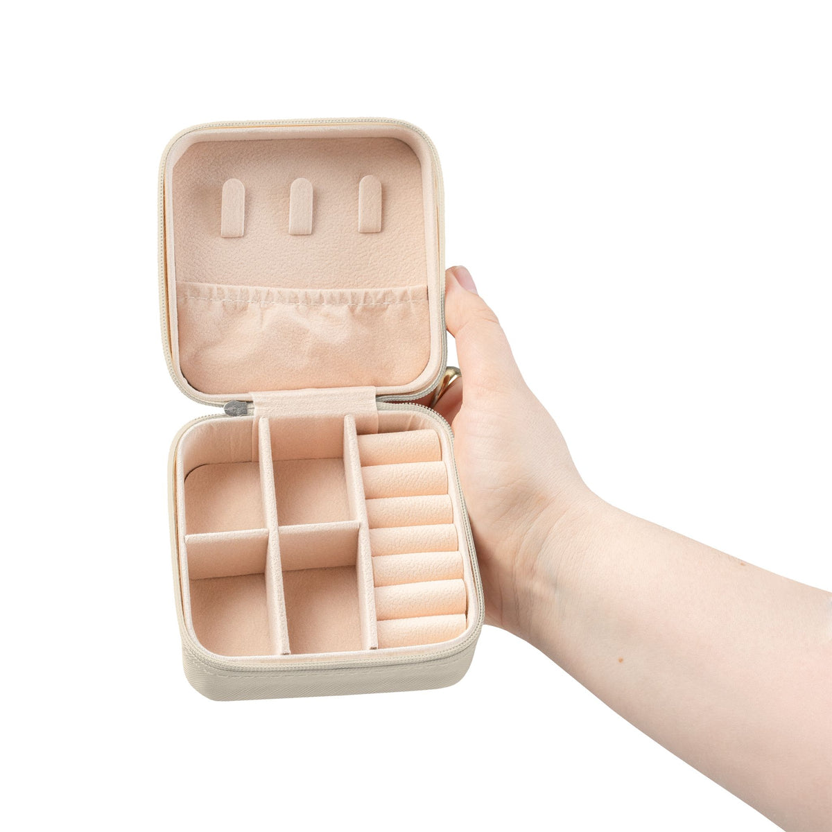 Salt & Starlight jewelry travel case in ivory, open view showing compartments and ring rolls