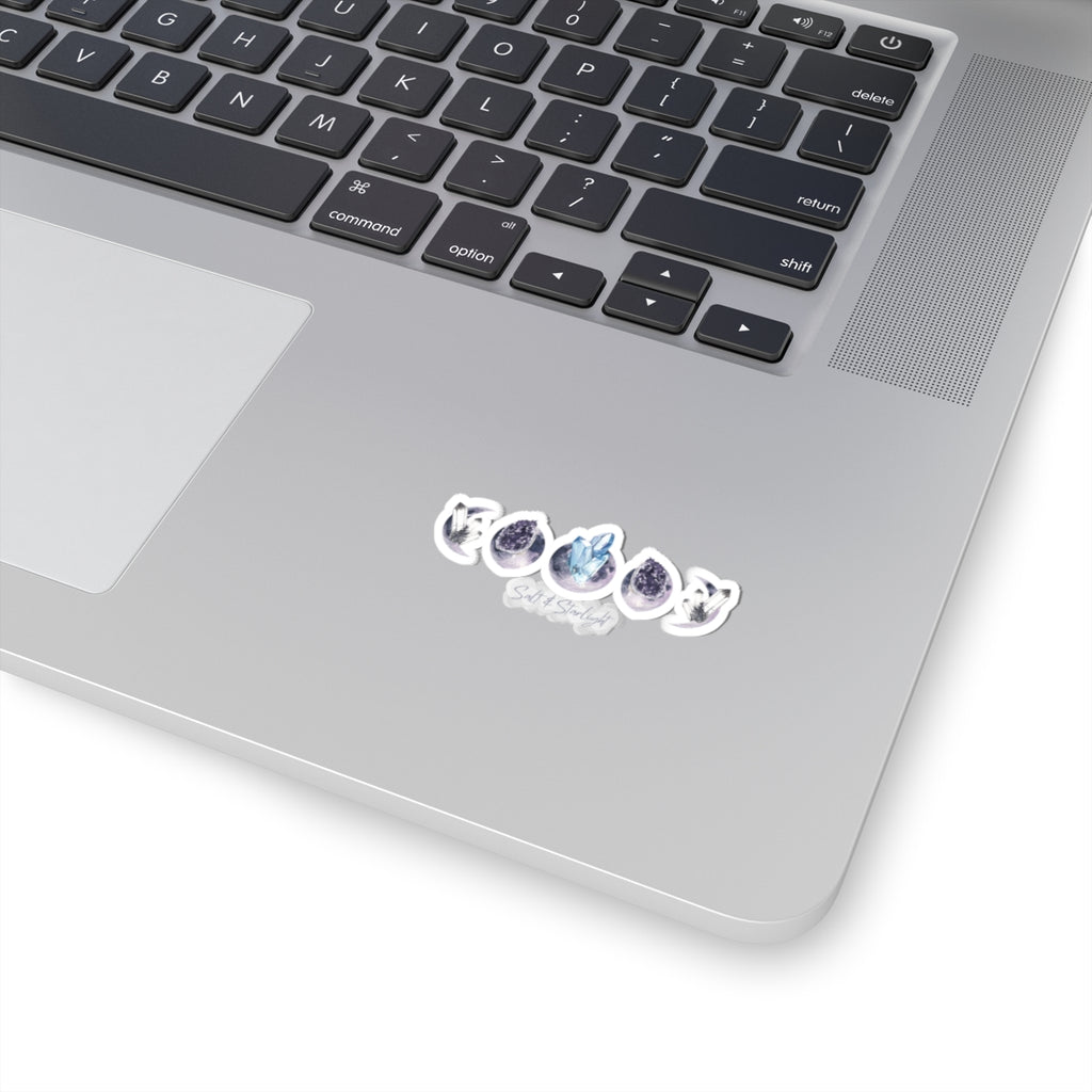 Salt & Starlight kiss-cut sticker with crystal moon phase design, shown on a laptop, small size