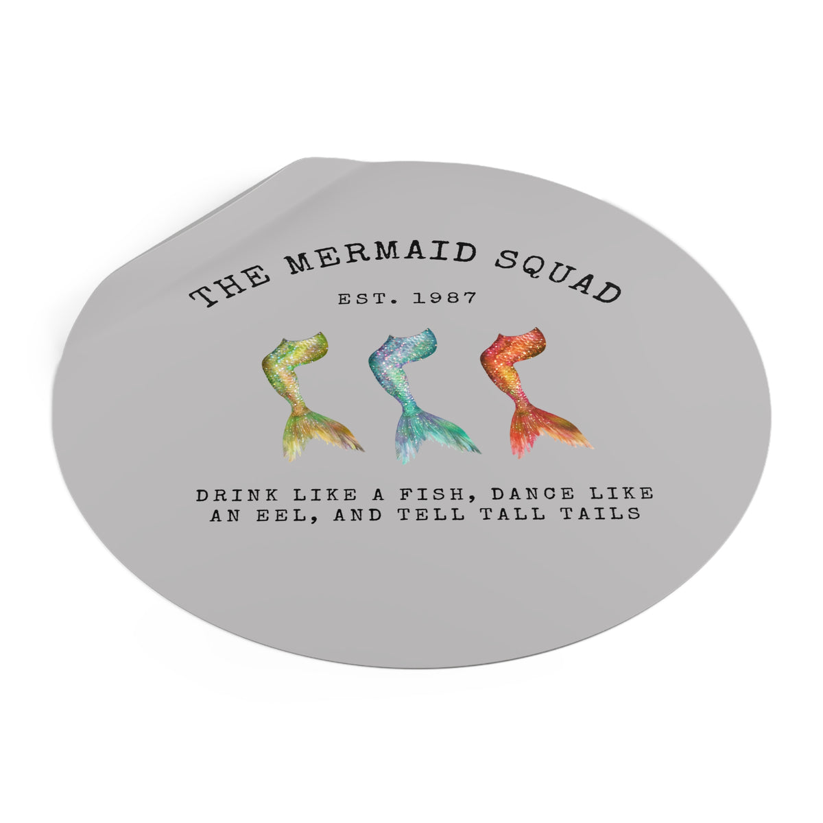 The Mermaid Squad round vinyl sticker in grey, peeling view, alternate angle